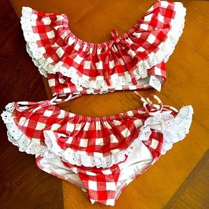 Well dressed wolf ruffle bikini size 2T. Worn once for pictures.